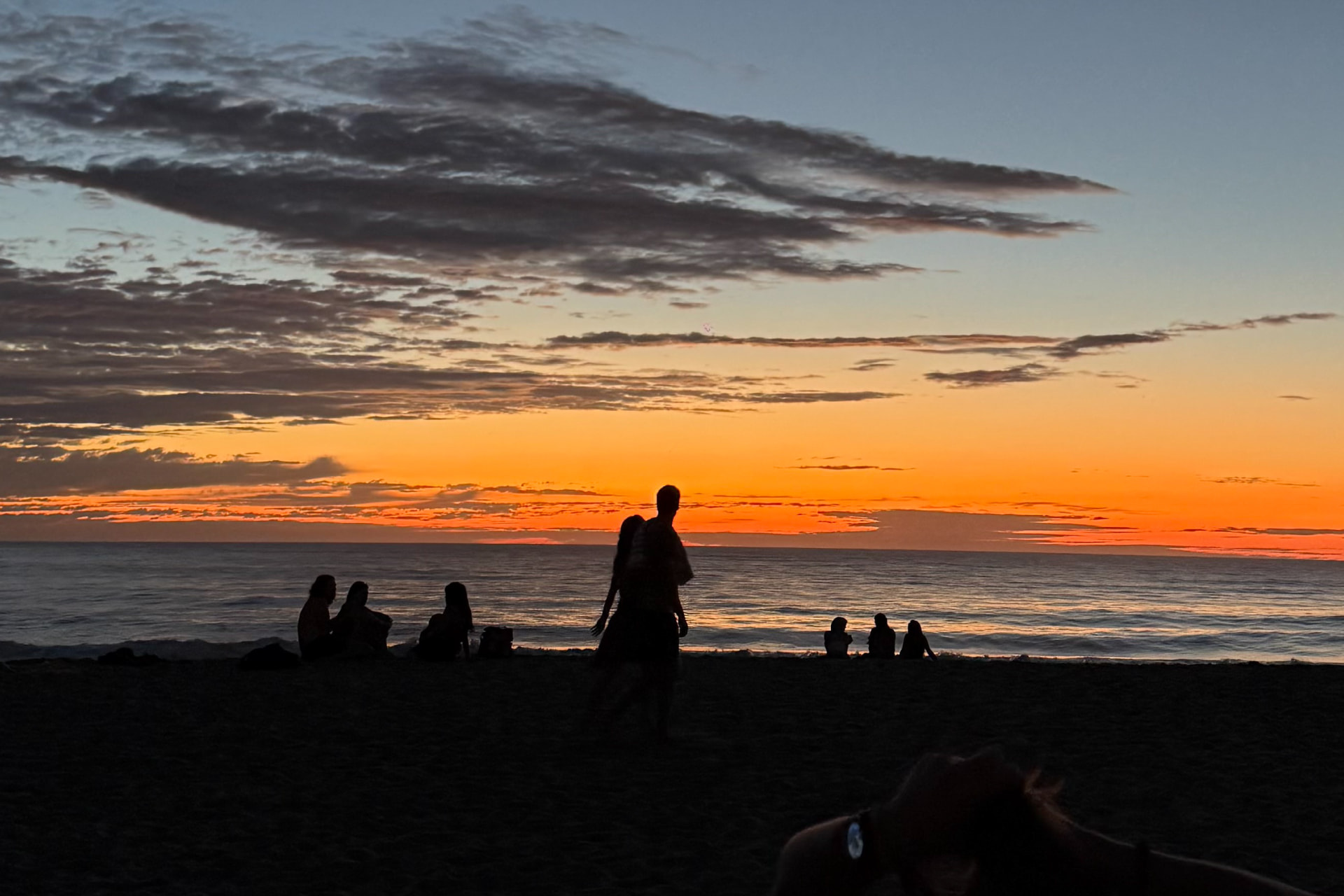 People gathering for a sunset party in Puerto Escondido