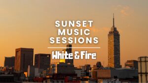 Sunset Music Sessions × White & Fire event poster featuring Torre Latinoamericana at sunset in Mexico City.